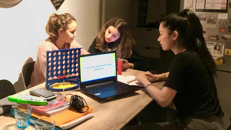 ITA graduate Lin Nguyen tutors young students in France
