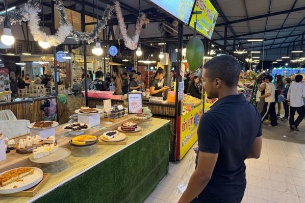 Kenneth checking out Thai food market in Thailand